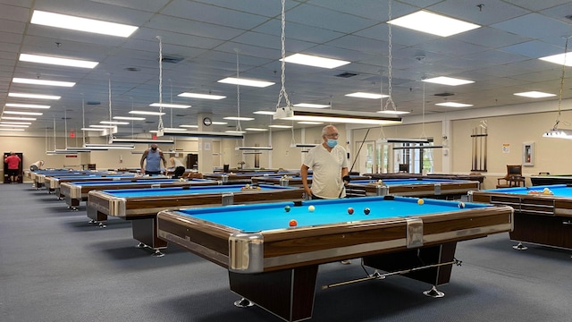 recreation room featuring carpet, pool table, and a paneled ceiling