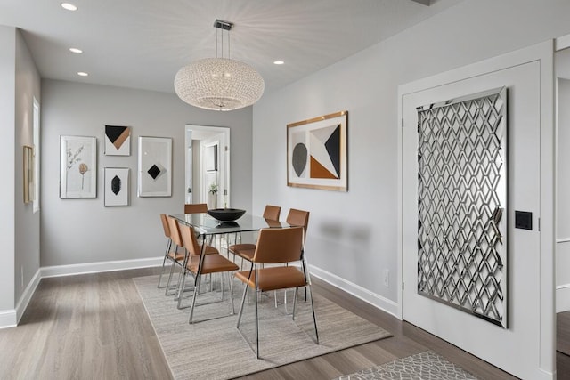 66 Capri B, Delray Beach, FL 33484 - dining room with wood finished floors, baseboards, and recessed lighting