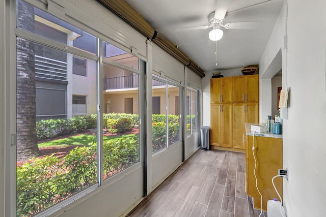 66 Capri B, Delray Beach, FL 33484 - unfurnished sunroom featuring a ceiling fan