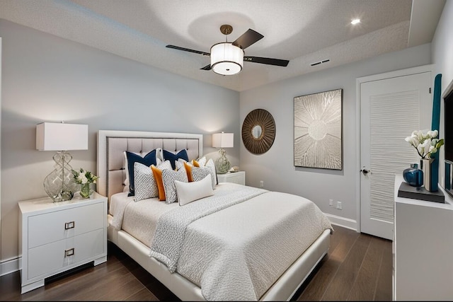 66 Capri B, Delray Beach, FL 33484 - bedroom featuring dark wood finished floors, baseboards, and ceiling fan