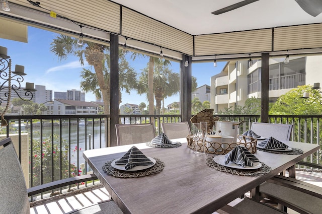 sunroom with a water view