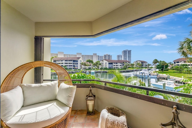 balcony featuring a water view