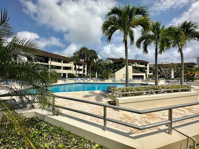 view of swimming pool with a patio area