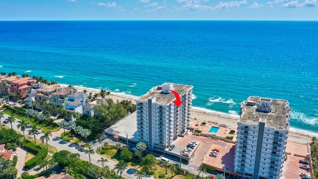 bird's eye view with a beach view and a water view