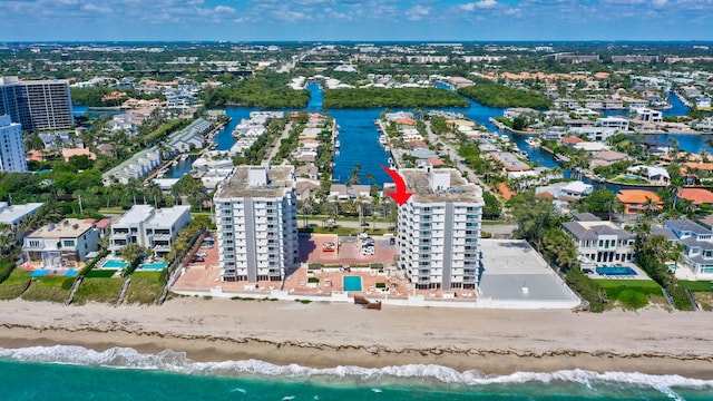 aerial view with a beach view and a water view