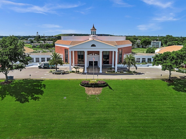 exterior space featuring a front yard