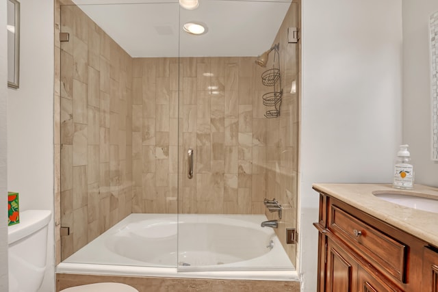 full bathroom with vanity, toilet, and shower / bath combination with glass door