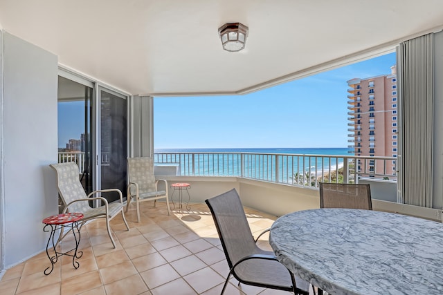 balcony featuring a water view