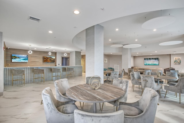 dining room with light tile floors