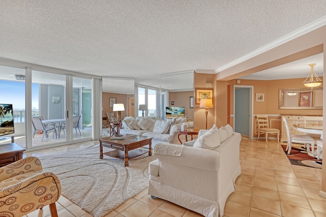 tiled living room featuring crown molding and a textured ceiling