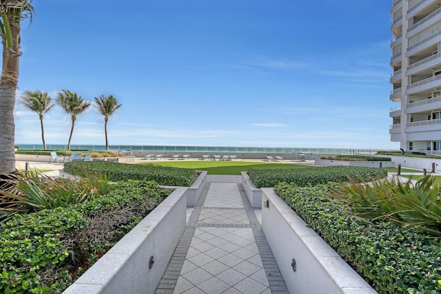 view of home's community with a water view