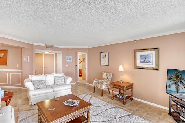 living room featuring crown molding, tile floors, and a textured ceiling