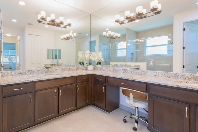 bathroom featuring tile floors and dual bowl vanity