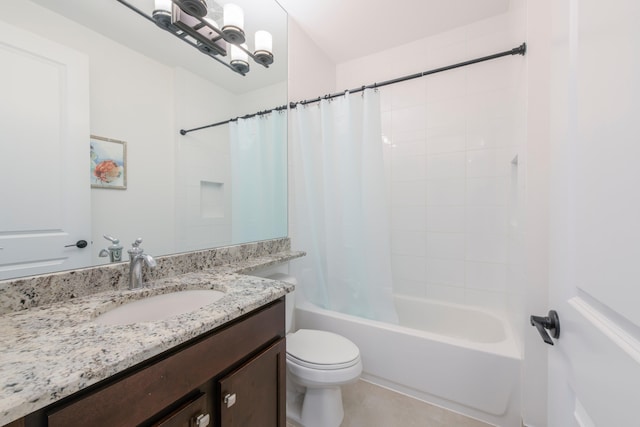 full bathroom featuring tile floors, oversized vanity, shower / bath combination with curtain, and toilet