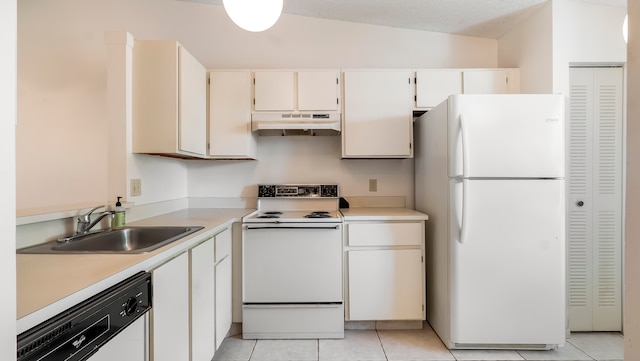 kitchen with white appliances, vaulted ceiling, light tile flooring, wall chimney exhaust hood, and sink