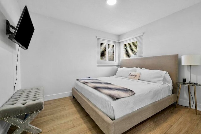 bedroom featuring hardwood / wood-style floors