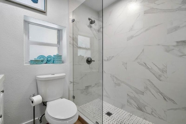 bathroom featuring walk in shower, plenty of natural light, and toilet