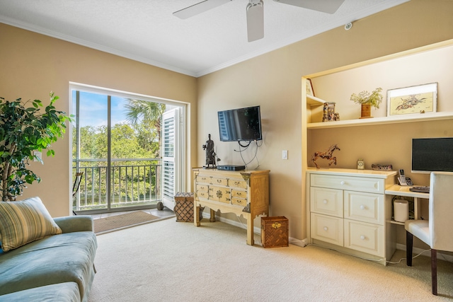 interior space with light colored carpet, ceiling fan, and ornamental molding