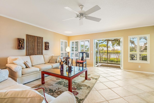 living room featuring ceiling fan, crown molding, and light tile flooring