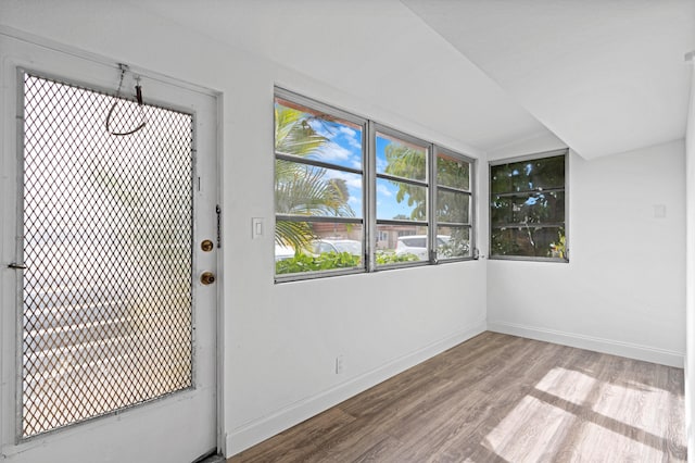 spare room featuring light hardwood / wood-style floors