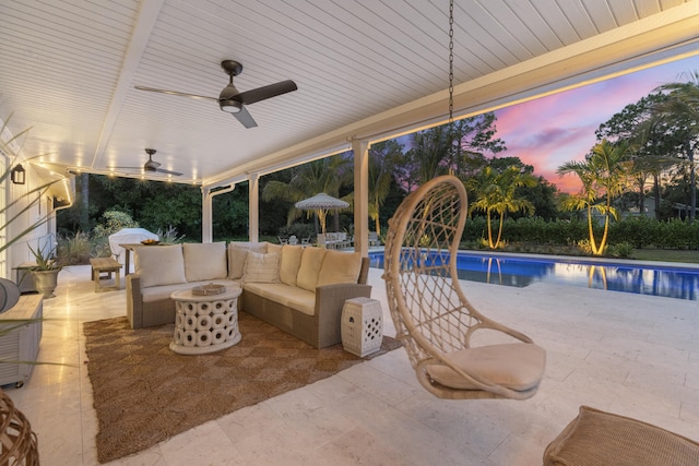 exterior space with ceiling fan, a patio area, and an outdoor hangout area