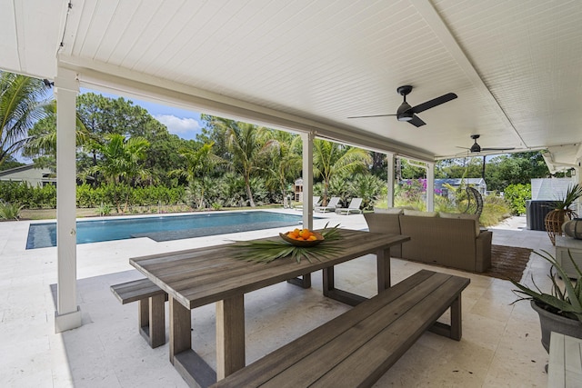 view of patio with ceiling fan and an outdoor hangout area