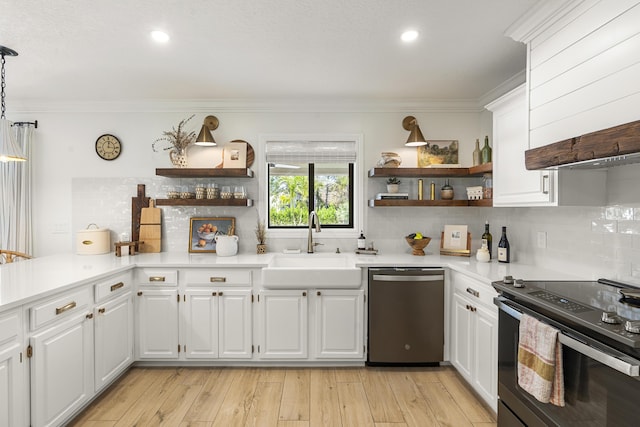 kitchen featuring white cabinetry, range with electric cooktop, dishwasher, hanging light fixtures, and sink