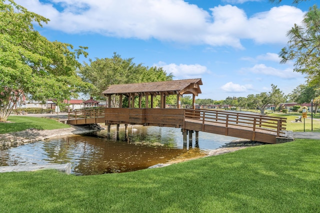 dock area with a yard