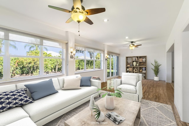 sunroom with ceiling fan