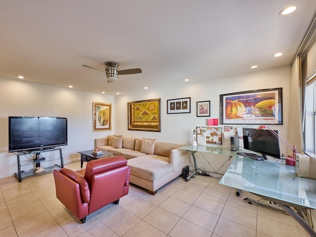 tiled living room with ceiling fan