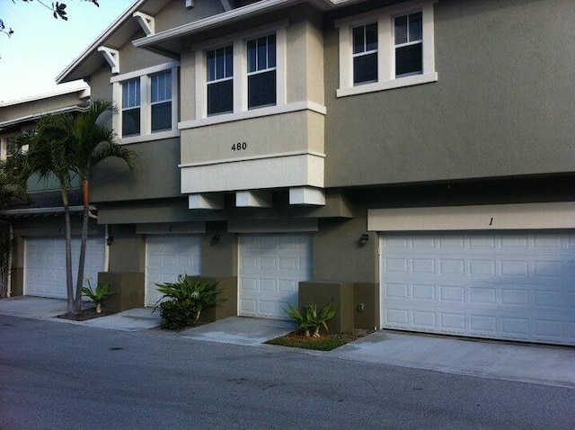 view of property featuring a garage