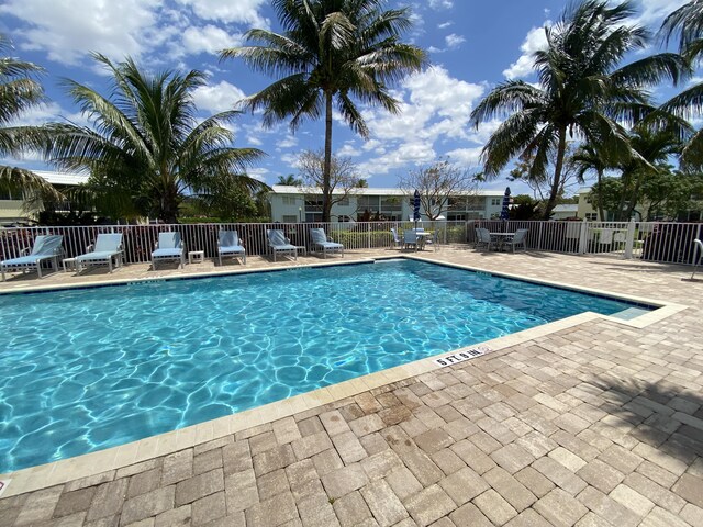 view of swimming pool featuring a patio