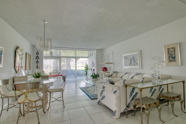 living room with a chandelier, floor to ceiling windows, a textured ceiling, and light tile flooring