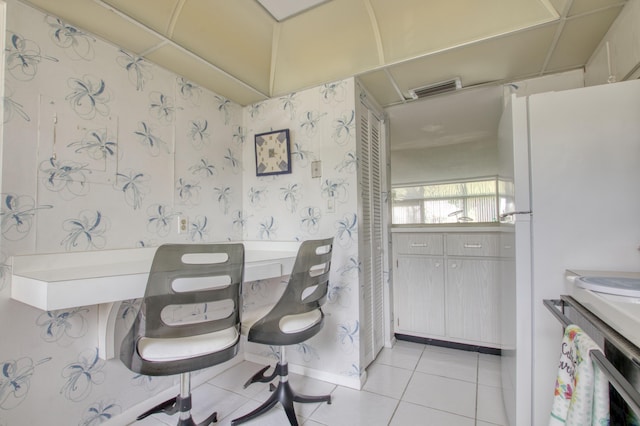 home office with light tile flooring