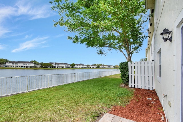 view of yard with a water view