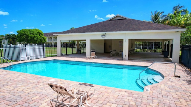 view of pool featuring a patio