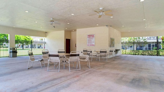 view of patio featuring ceiling fan