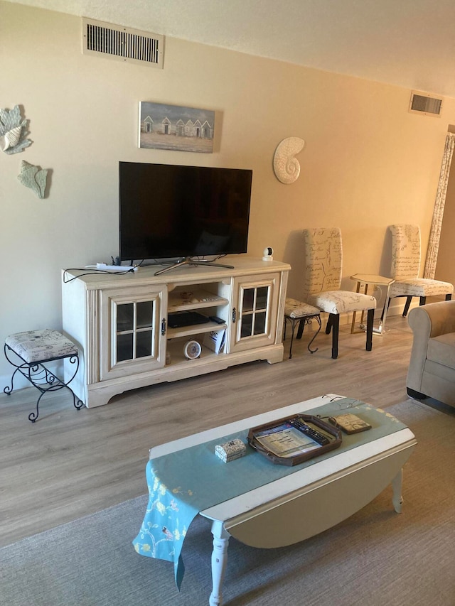 living room with hardwood / wood-style floors