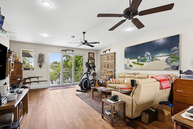 living room with light hardwood / wood-style floors