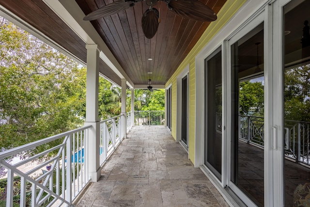 balcony featuring ceiling fan