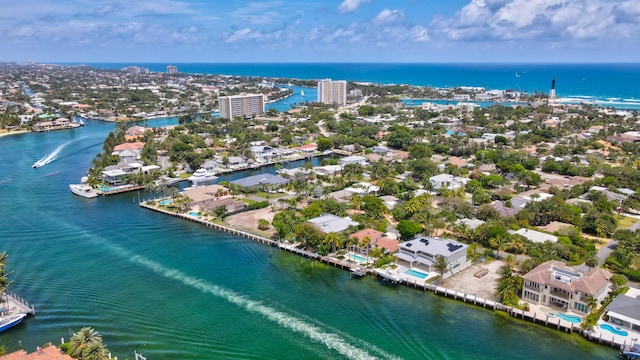 birds eye view of property featuring a water view