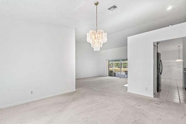 unfurnished living room with light carpet and a chandelier