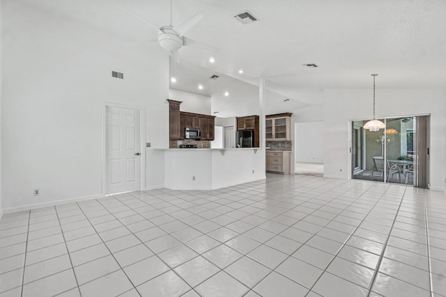 unfurnished living room featuring ceiling fan, light tile patterned flooring, and high vaulted ceiling