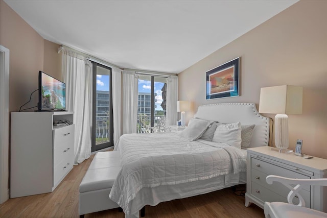 bedroom with light wood-type flooring