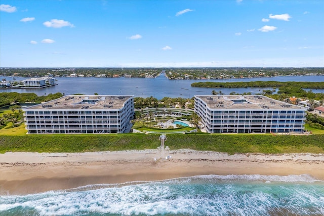 bird's eye view with a beach view and a water view