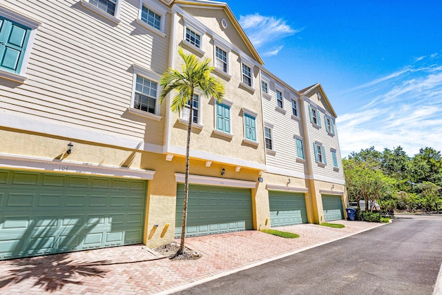 view of property featuring a garage