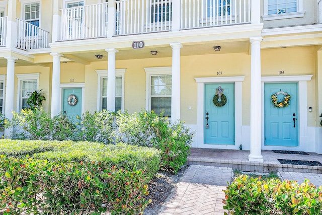 doorway to property with a balcony