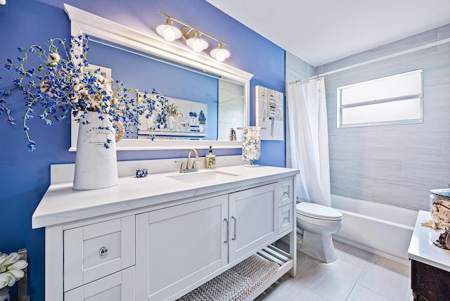 full bathroom featuring shower / tub combo, toilet, tile floors, and vanity