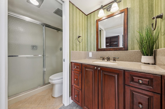 bathroom featuring a shower with door, toilet, tile flooring, and vanity