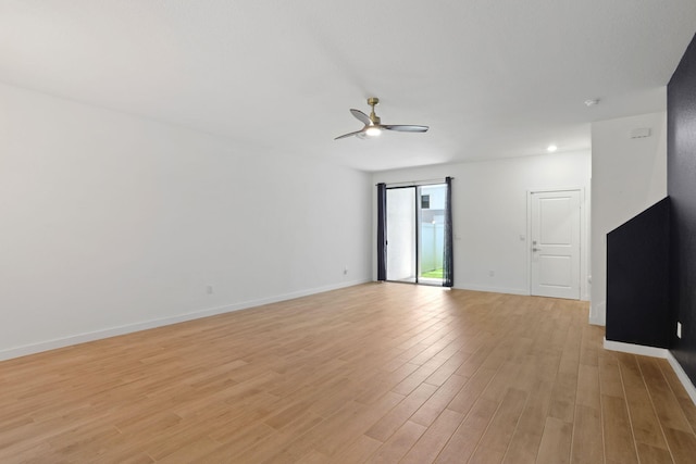 unfurnished room with ceiling fan and light hardwood / wood-style floors